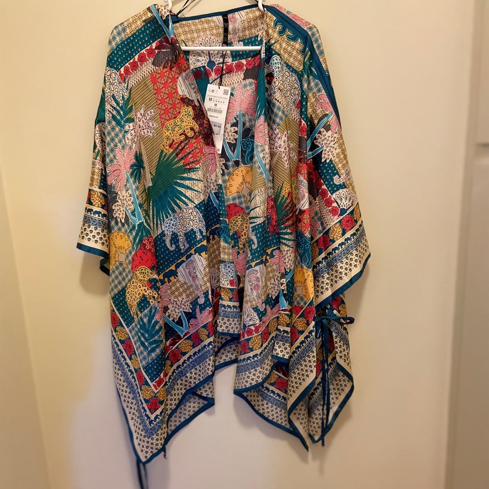Silk wrap top in African safari print
